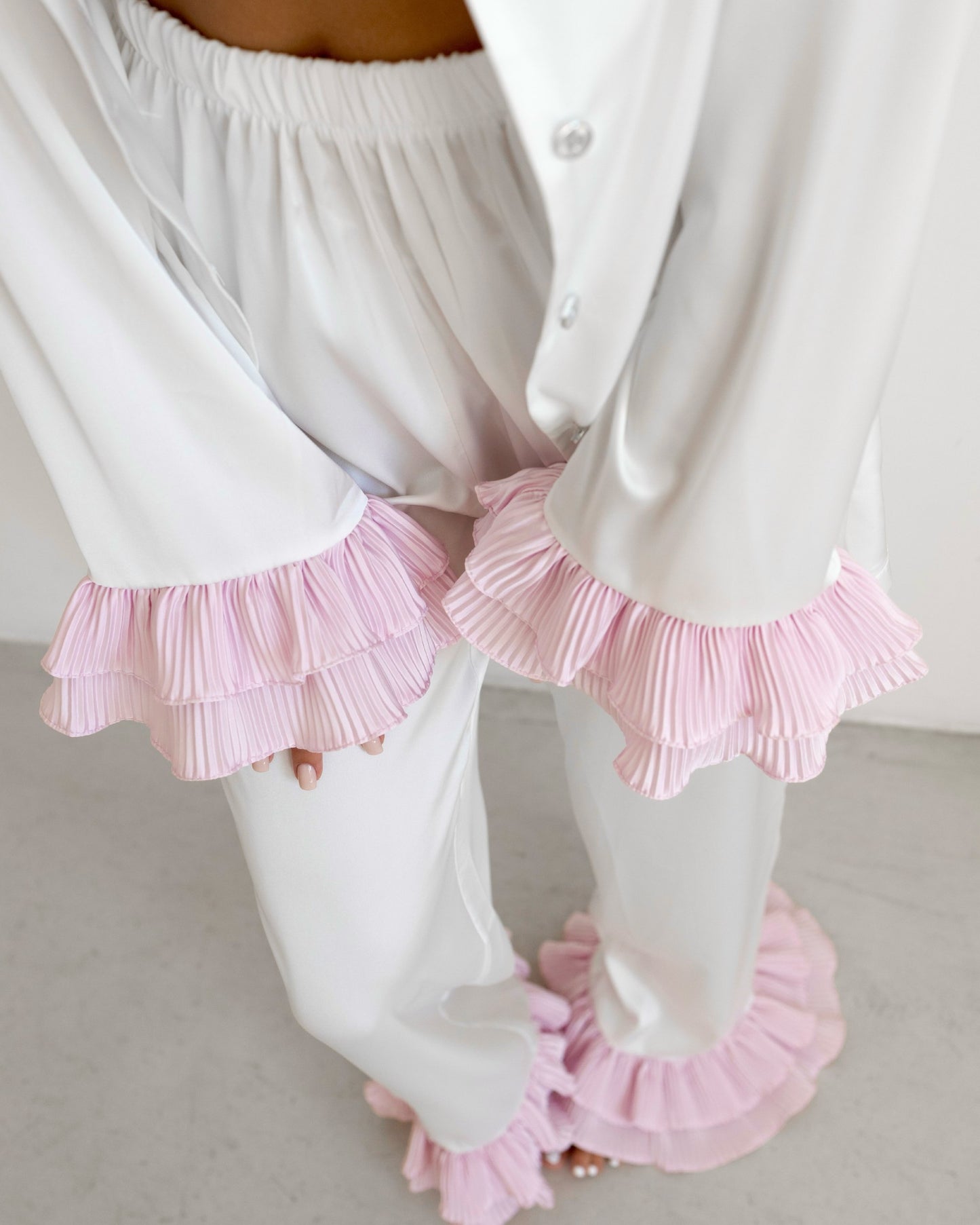 Aurora — lounge set with pink ruffles
