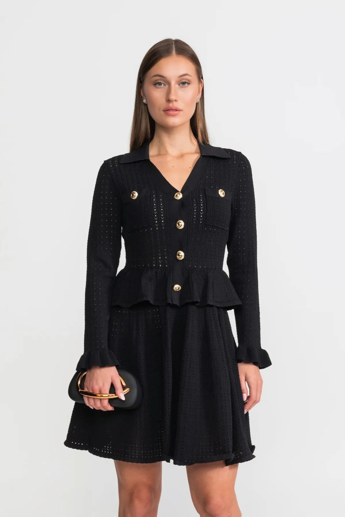 Двокомпонентний фактурний комплект з жакетом з баскою та міні-спідницею чорного кольору